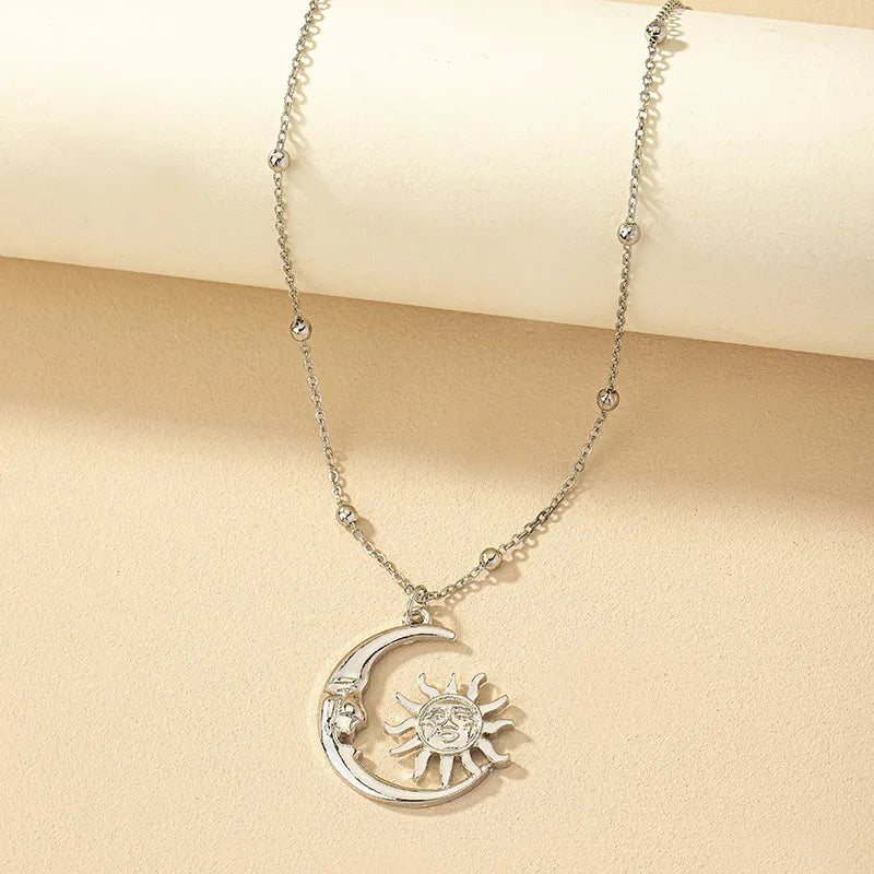 Sun In Crescent Moon Necklace