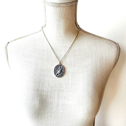 Raven + Crescent Moon Silver Pendant
