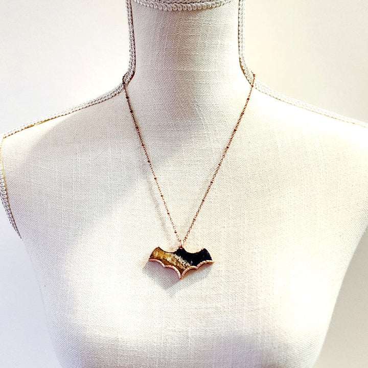 Fossilized Wood Bat Necklace