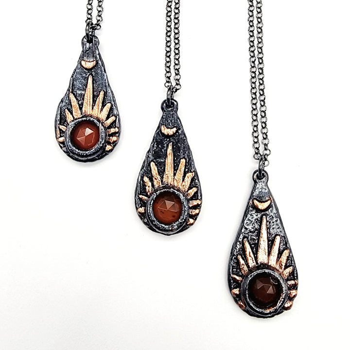 Gunmetal Faceted Carnelian Sunburst Necklace
