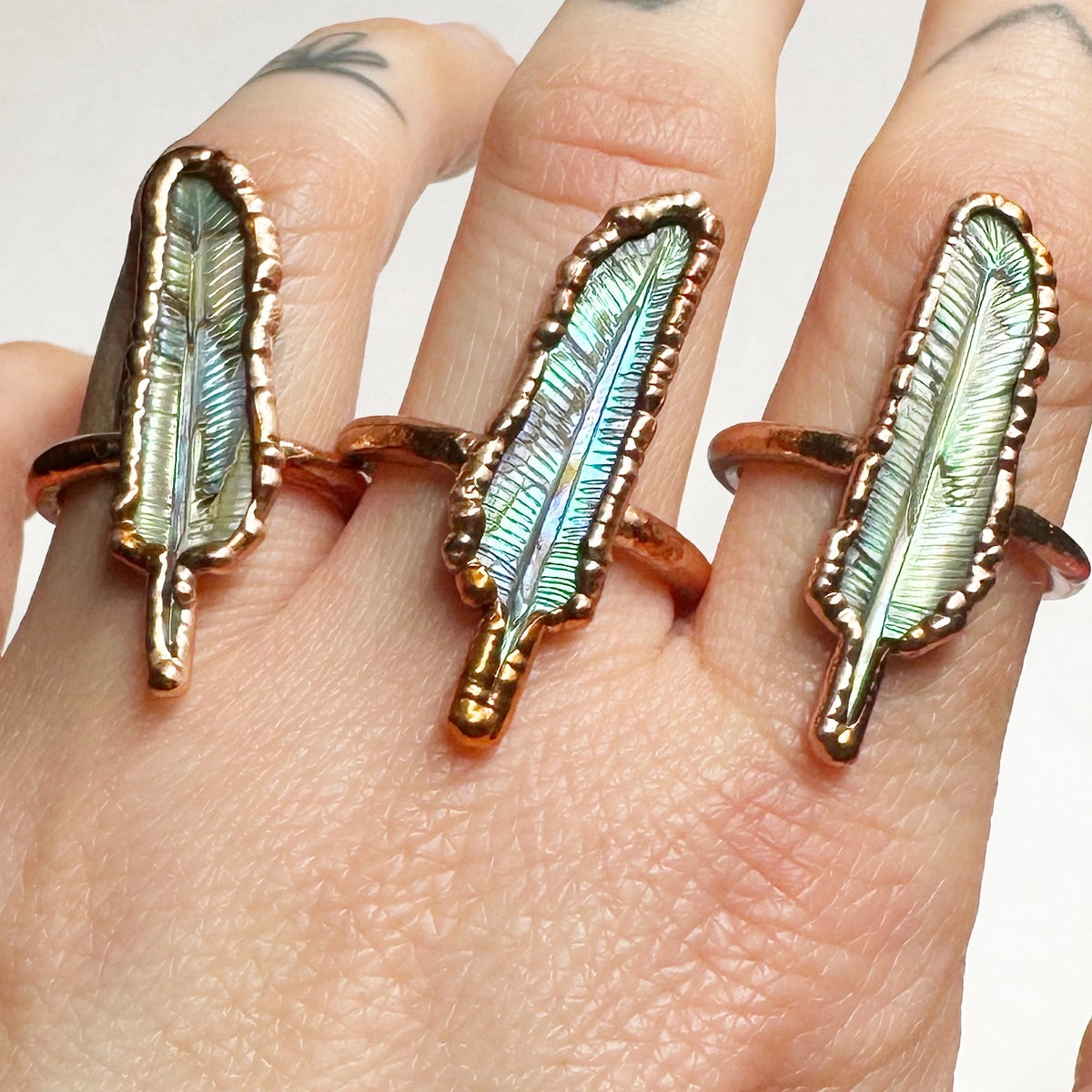 Carved Abalone Feather Ring