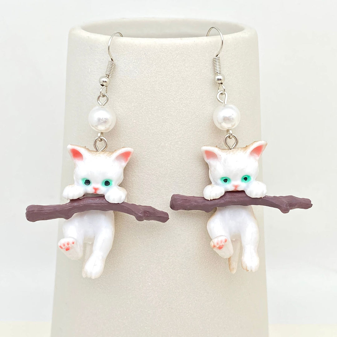 Kitten On Branch Dangles