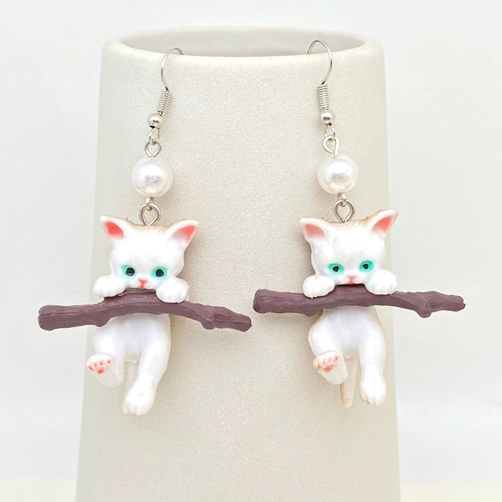 Kitten On Branch Dangles