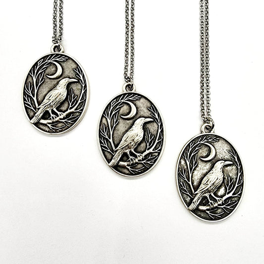 Raven + Crescent Moon Silver Pendant