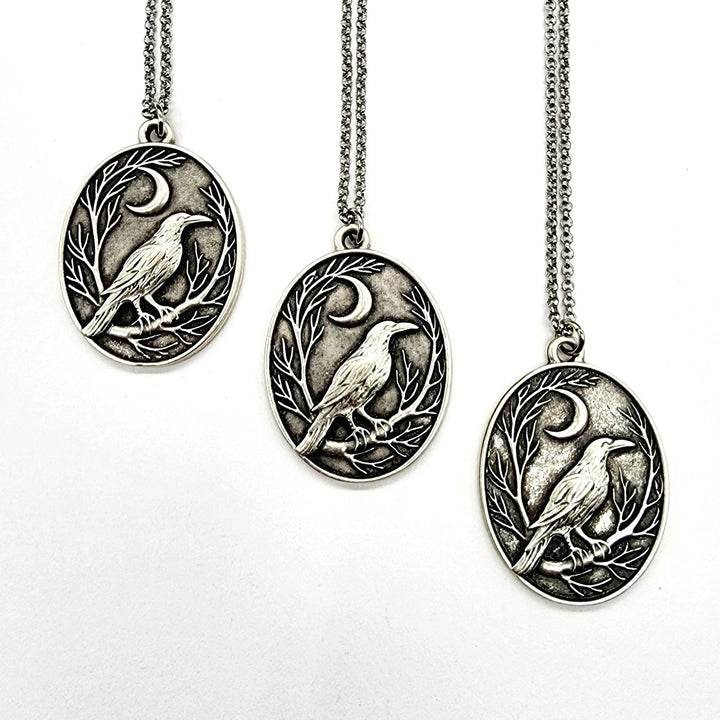 Raven + Crescent Moon Silver Pendant