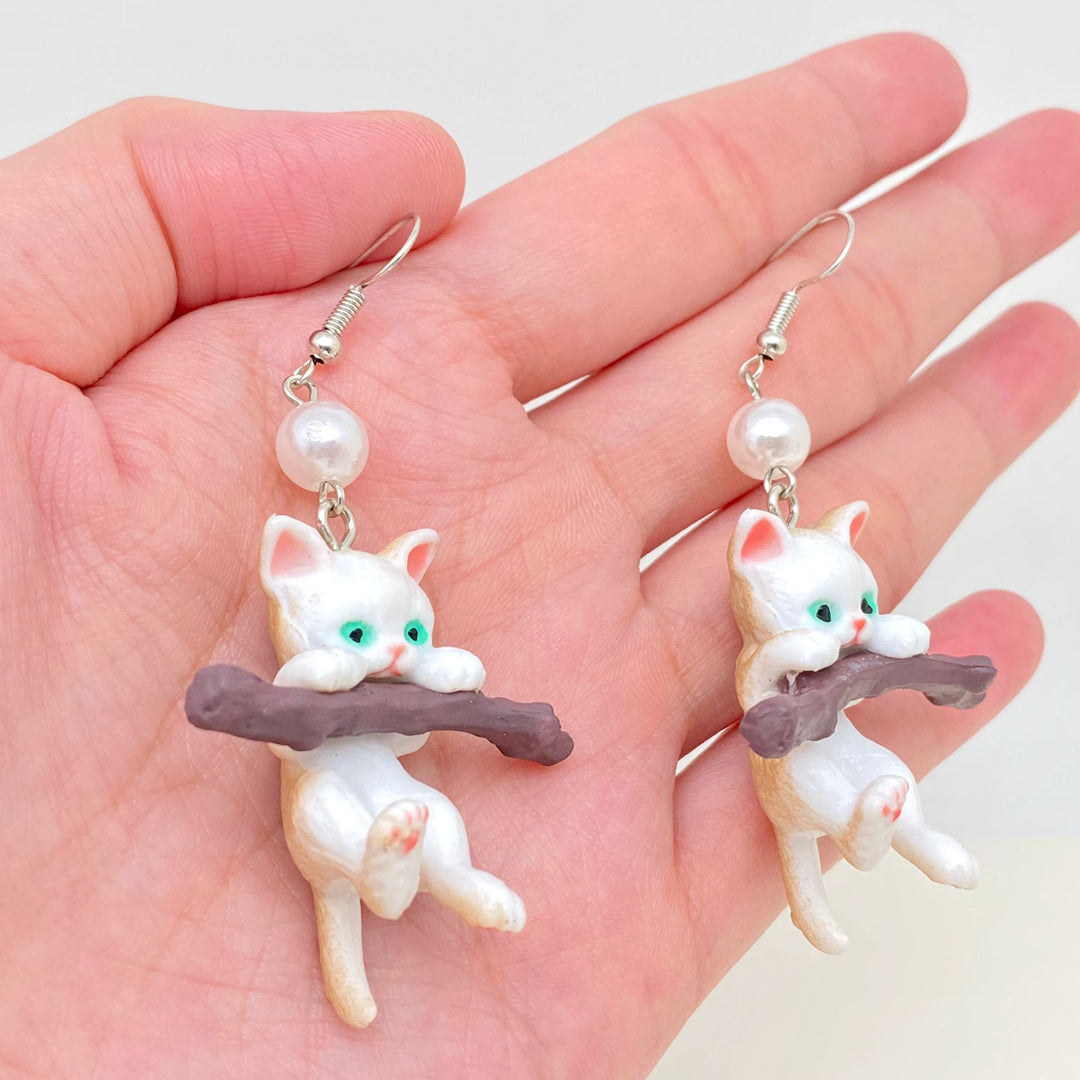 Kitten On Branch Dangles